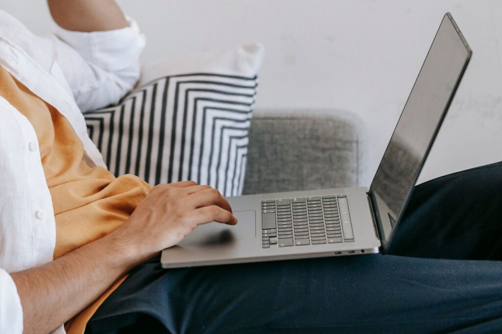 Rocket Mortgage vs Better comparison: person applying for a mortgage online on a laptop